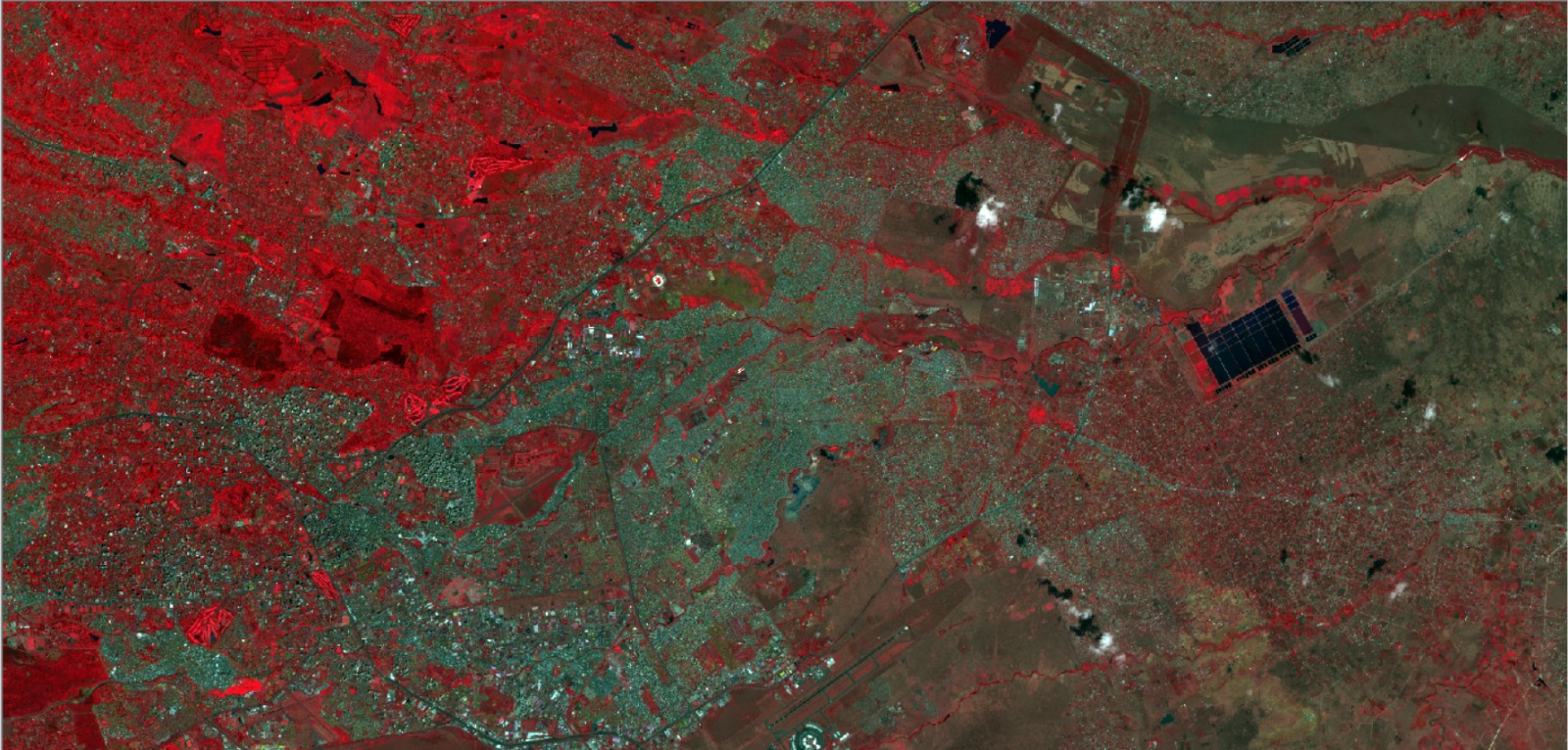 Short-wave infrared satellite composite showing vegetation, soil and water